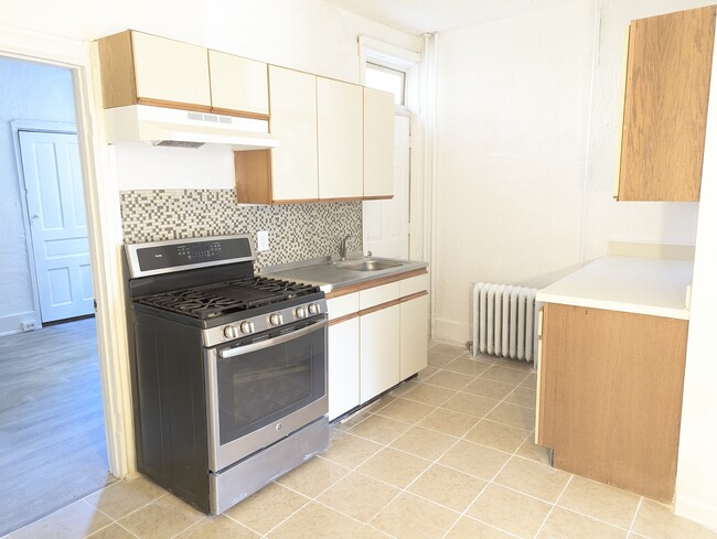5833 Crittenden St, Unit 1F