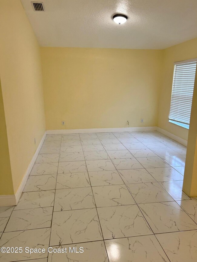 3266 Weyburn Ave SE in Palm Bay, FL - Building Photo - Building Photo