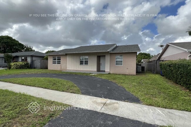 property at 7711 SW 6th Ct
