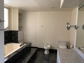 7711 Sausalito Ave in Canoga Park, CA - Building Photo - Building Photo