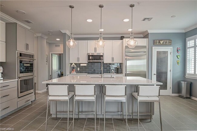 18256 Creekside Preserve Loop, Unit 201 in Ft. Myers, FL - Foto de edificio - Building Photo