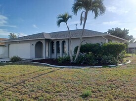 SECTION 8!! 3/2 With Fenced Yard!!! in Cape Coral, FL - Building Photo