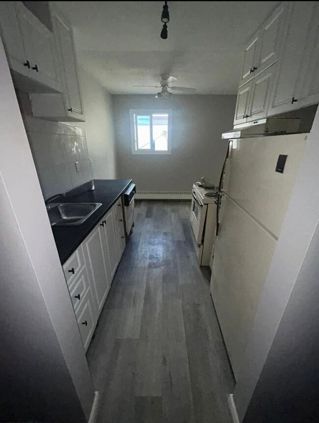 property at 9312-9104 104 Ave NW