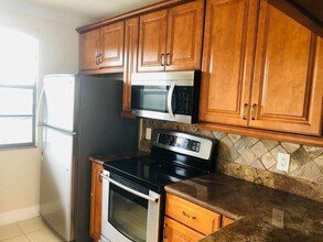 6025 Balboa Cir-Unit -402 in Boca Raton, FL - Building Photo - Building Photo