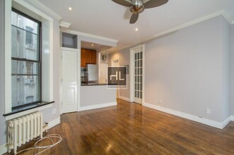 Mott Street, Unit 5R in New York, NY - Building Photo - Building Photo