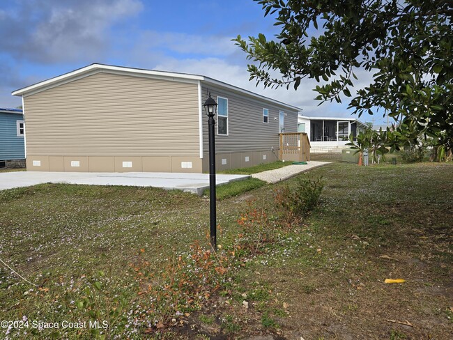 402 Raven Dr in Micco, FL - Building Photo - Building Photo