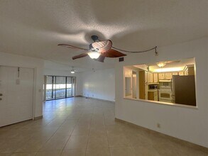 723 Sunny Pine Way, Unit G1 in Greenacres, FL - Building Photo - Building Photo