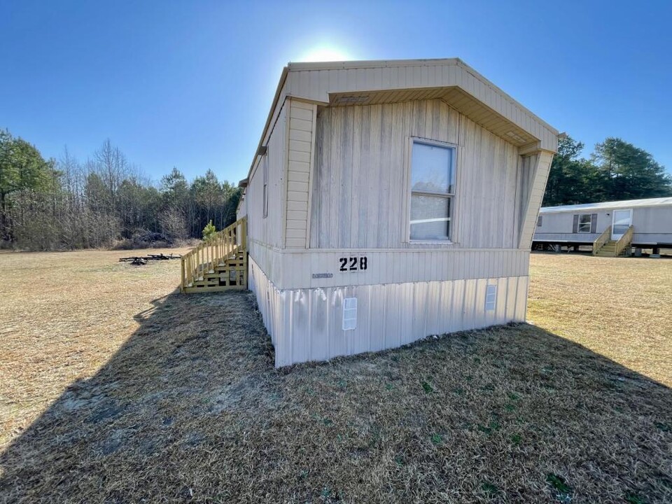 228 Tranquility Ln in Shannon, NC - Foto de edificio