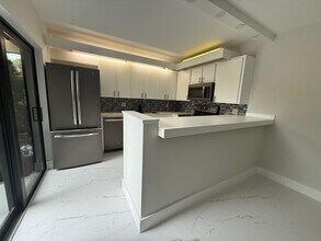 3900 SE County Line Rd, Unit 4253 Big Ben in Jupiter, FL - Building Photo - Building Photo