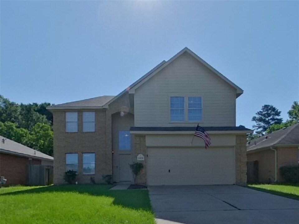 11835 Belle Ct in Pinehurst, TX - Building Photo