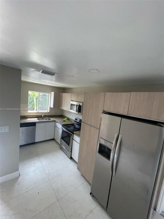 property at 815 NW 3rd Ave