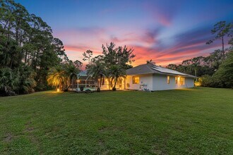 14693 62nd Ct N in The Acreage, FL - Building Photo - Building Photo