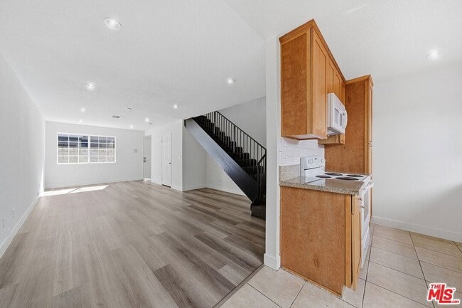 property at 6616 Sylmar Ave