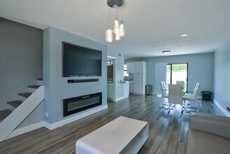 6052 Lace Wood Cir in Atlantis, FL - Building Photo - Building Photo
