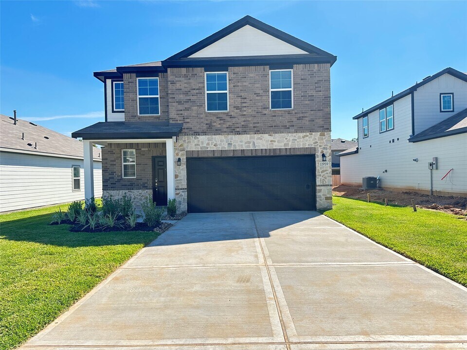 11959 Wisteria Mdws Dr in Willis, TX - Building Photo