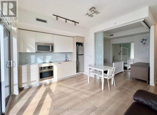 property at 210 Simcoe St