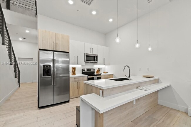 property at 4433 NW 9th St.