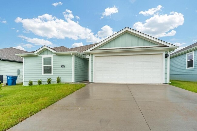 property at 307 NW Granny Smith St