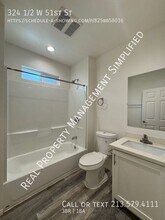 324 1/2 W 51st St in Los Angeles, CA - Building Photo - Building Photo