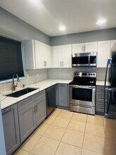 423 Pine Tree Ct in Atlantis, FL - Building Photo - Building Photo