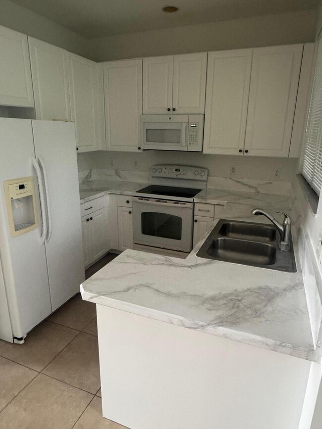 4459 Cotswold Hills Dr in Lake Worth Beach, FL - Building Photo - Building Photo