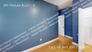 209 Poplar Alley in Russell, KY - Building Photo - Building Photo