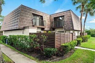 15319 W Pond Woods Dr in Lake Magdalene, FL - Building Photo