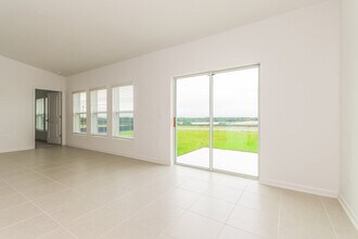 7677 Gemstone St in Groveland, FL - Building Photo - Building Photo
