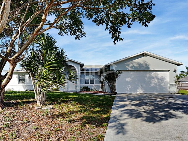 property at 332 SW Hollyhock Ct