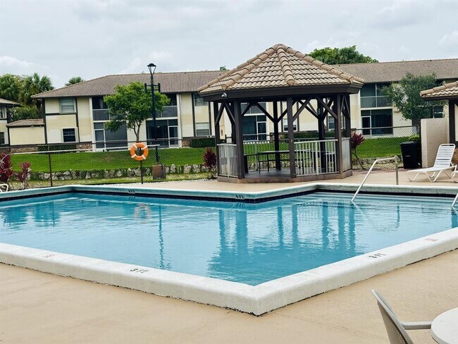2391 NW 89th Dr in Coral Springs, FL - Building Photo - Building Photo