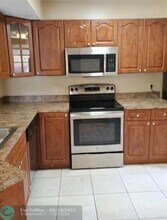 9033 Wiles Rd in Coral Springs, FL - Building Photo - Building Photo