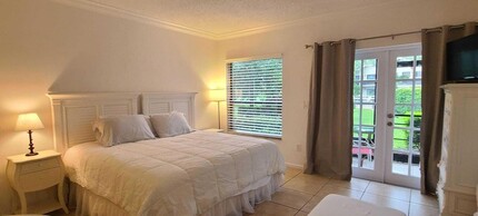 11863 Wimbledon Cir, Unit 403 in Wellington, FL - Foto de edificio - Building Photo