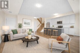 1565 Rose Way in Milton, ON - Building Photo