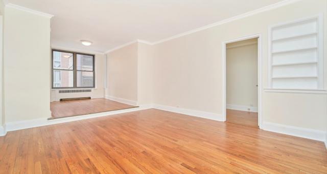 property at 124 E 24th St