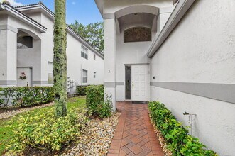 7910 Laina Ln in Boynton Beach, FL - Building Photo - Building Photo