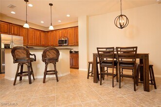 9054 Capistrano St N in Naples, FL - Foto de edificio - Building Photo