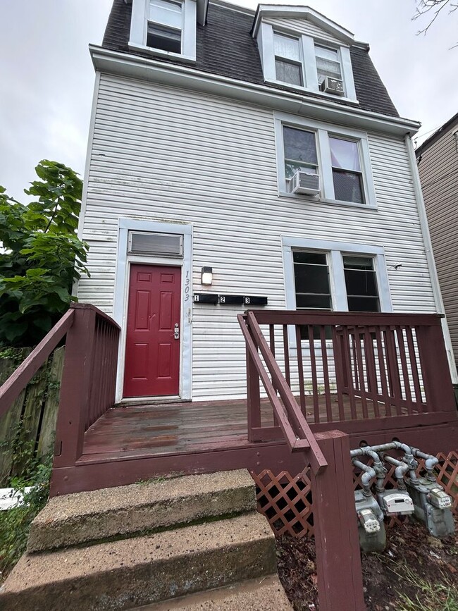 property at 1303 Woodland Ave