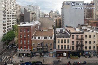 101 E 10th St, Unit FL8-ID1153 in New York, NY - Building Photo - Building Photo