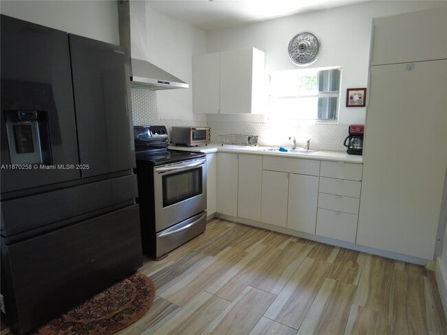 property at 265 NE 151st St