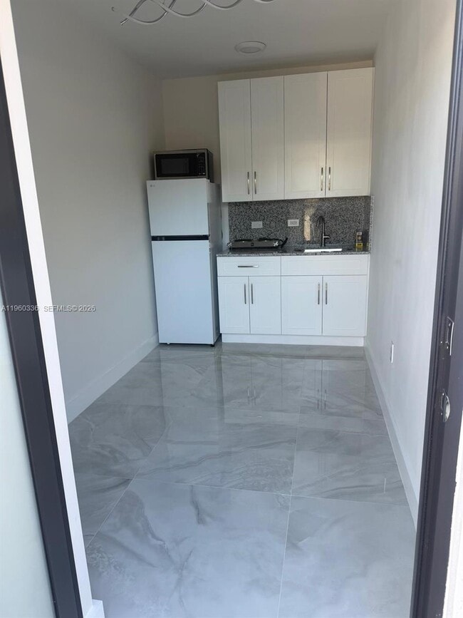 property at 67XX SW 134th St