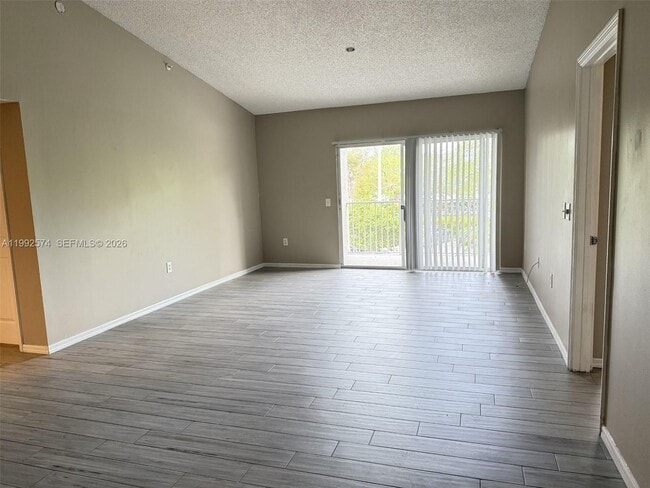 5015 Wiles Rd in Coconut Creek, FL - Building Photo - Building Photo