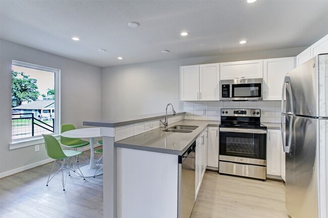 645 E 11th 1/2 St