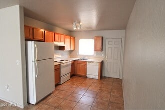 9975 W Lynx Dr in Arizona City, AZ - Building Photo - Building Photo