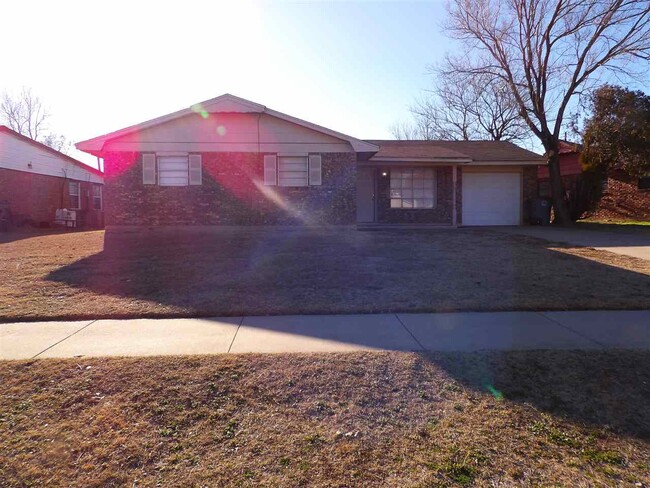 property at 3210 NE Cimarron Trail