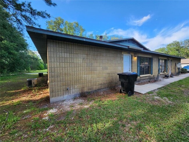 property at 6136 NW 26th St