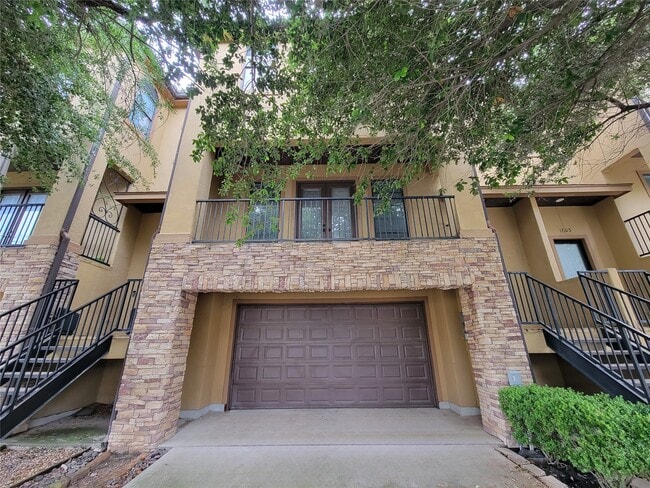 property at 1605 W 14th St