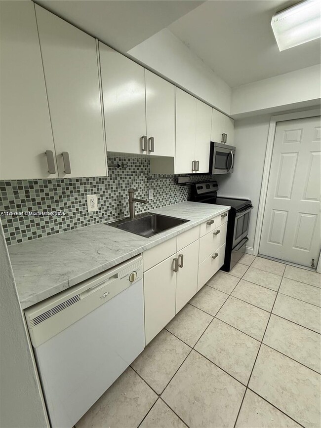 property at 9971 W Bay Harbor Dr