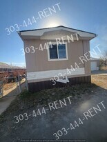 219 Balsam St in Log Lane Village, CO - Building Photo