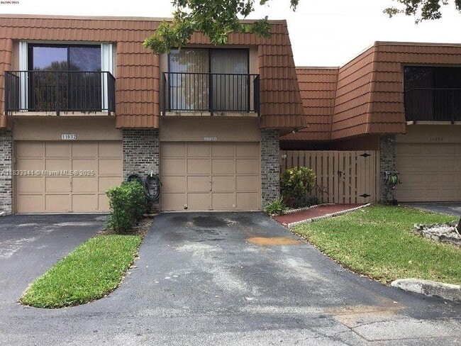 property at 11034 SW 15th Manor