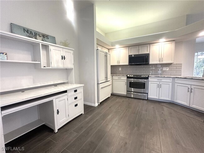 property at 6922 Satinleaf Rd N